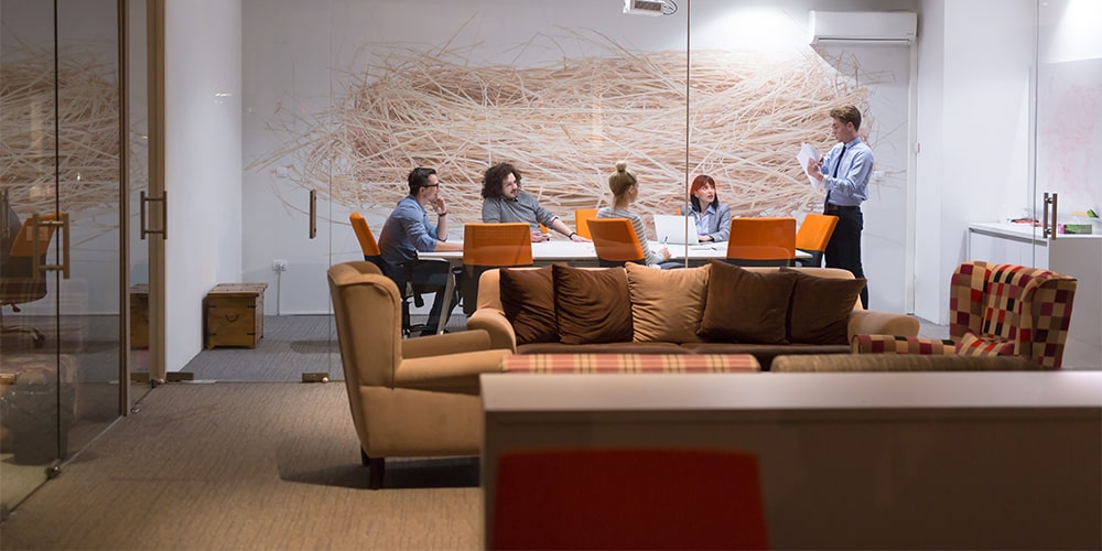 Somebody touching digital icons representing different types of technolgoy