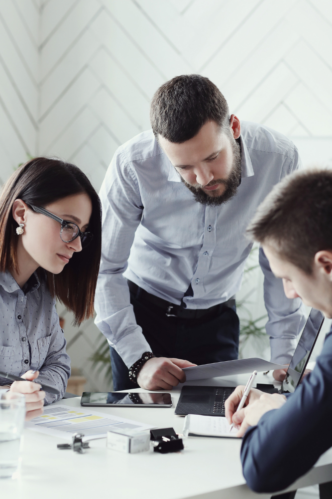 Project and Programme managers looking at a desk